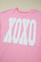 Pink Bow Sequin XOXO Letter Graphic Exposed Seam Baggy Sweatshirt